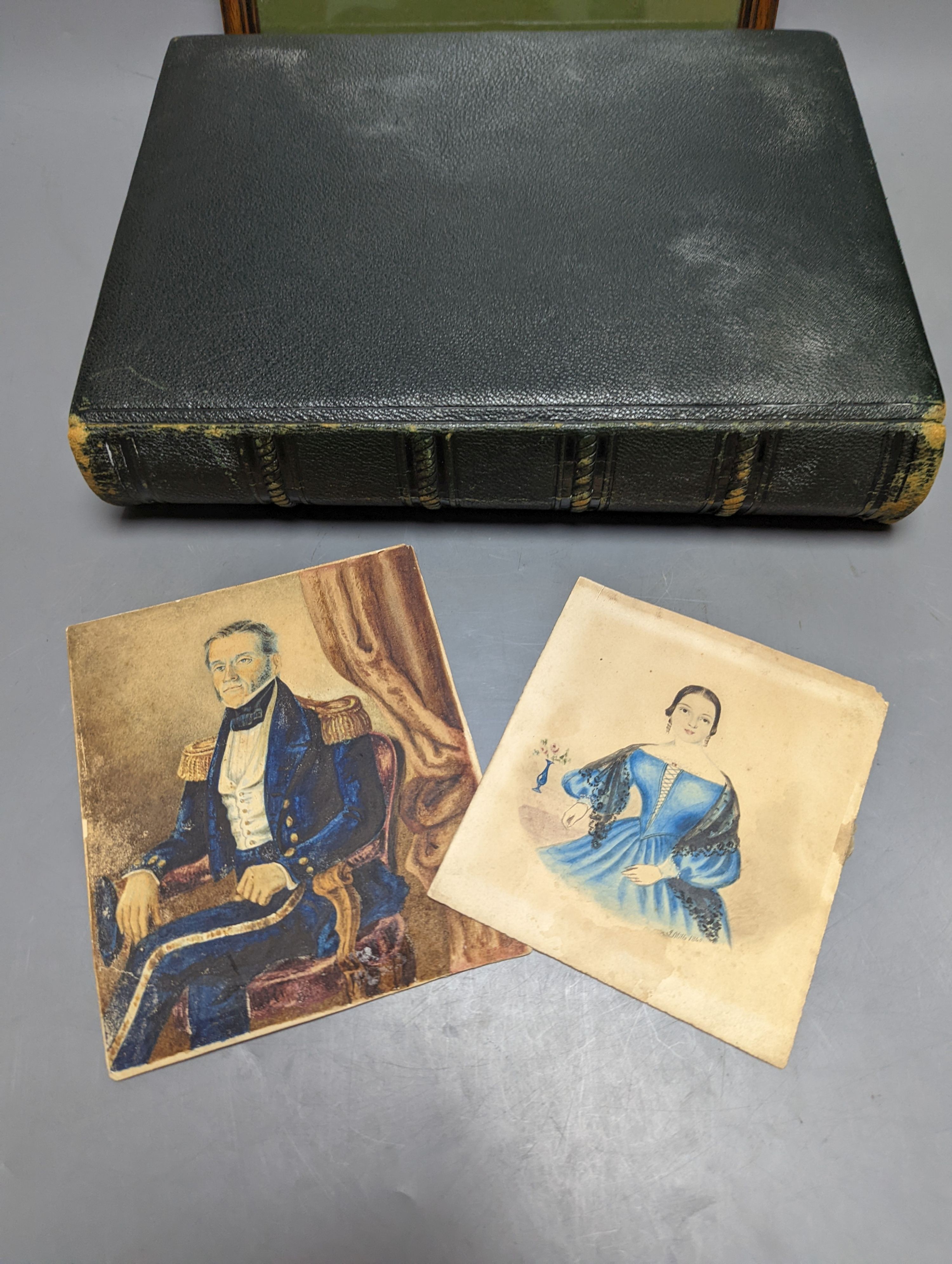 Two Victorian leather photograph albums, without contents, two Victorian portrait miniatures, ephemera, etc.